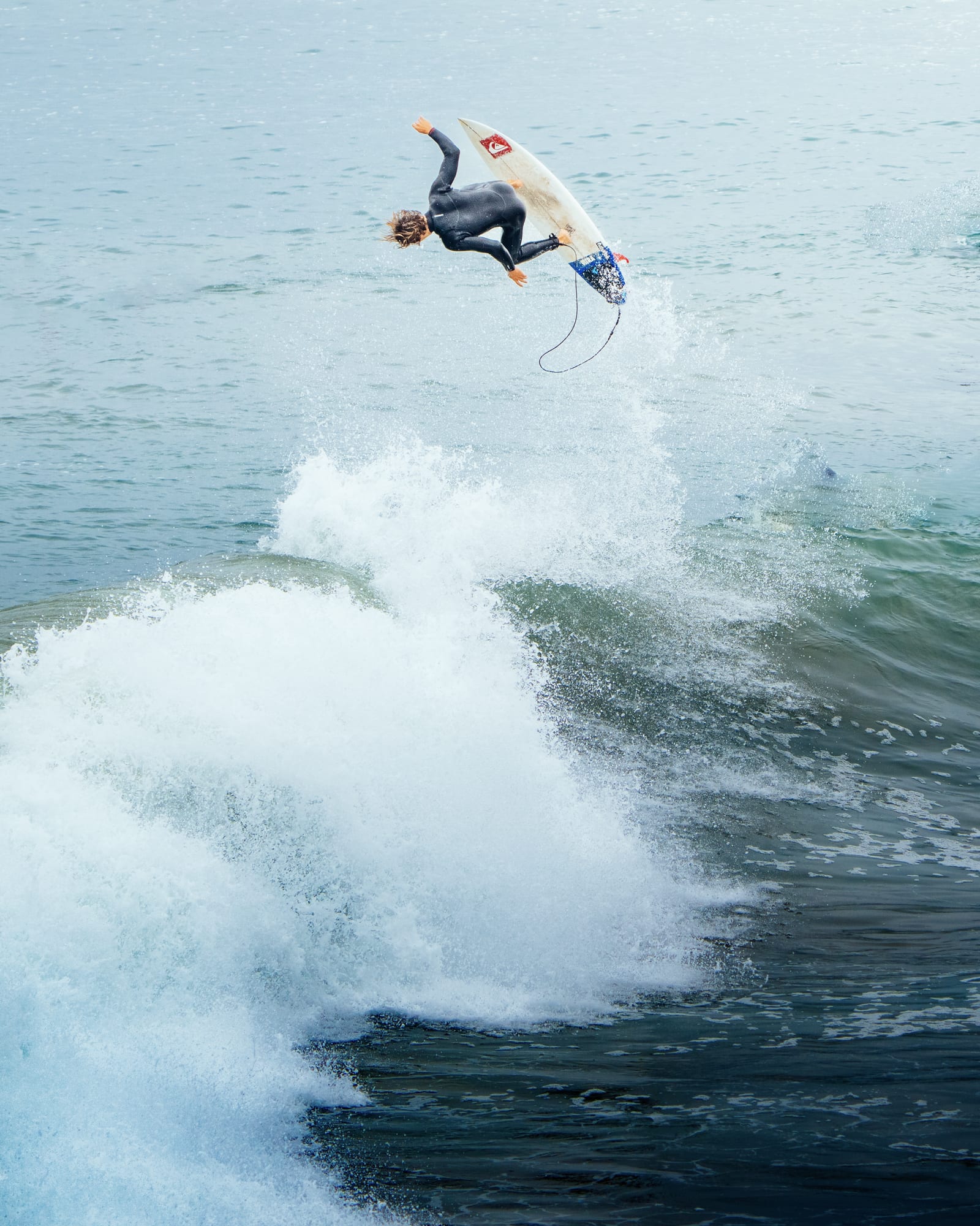 Surfer going over the falls