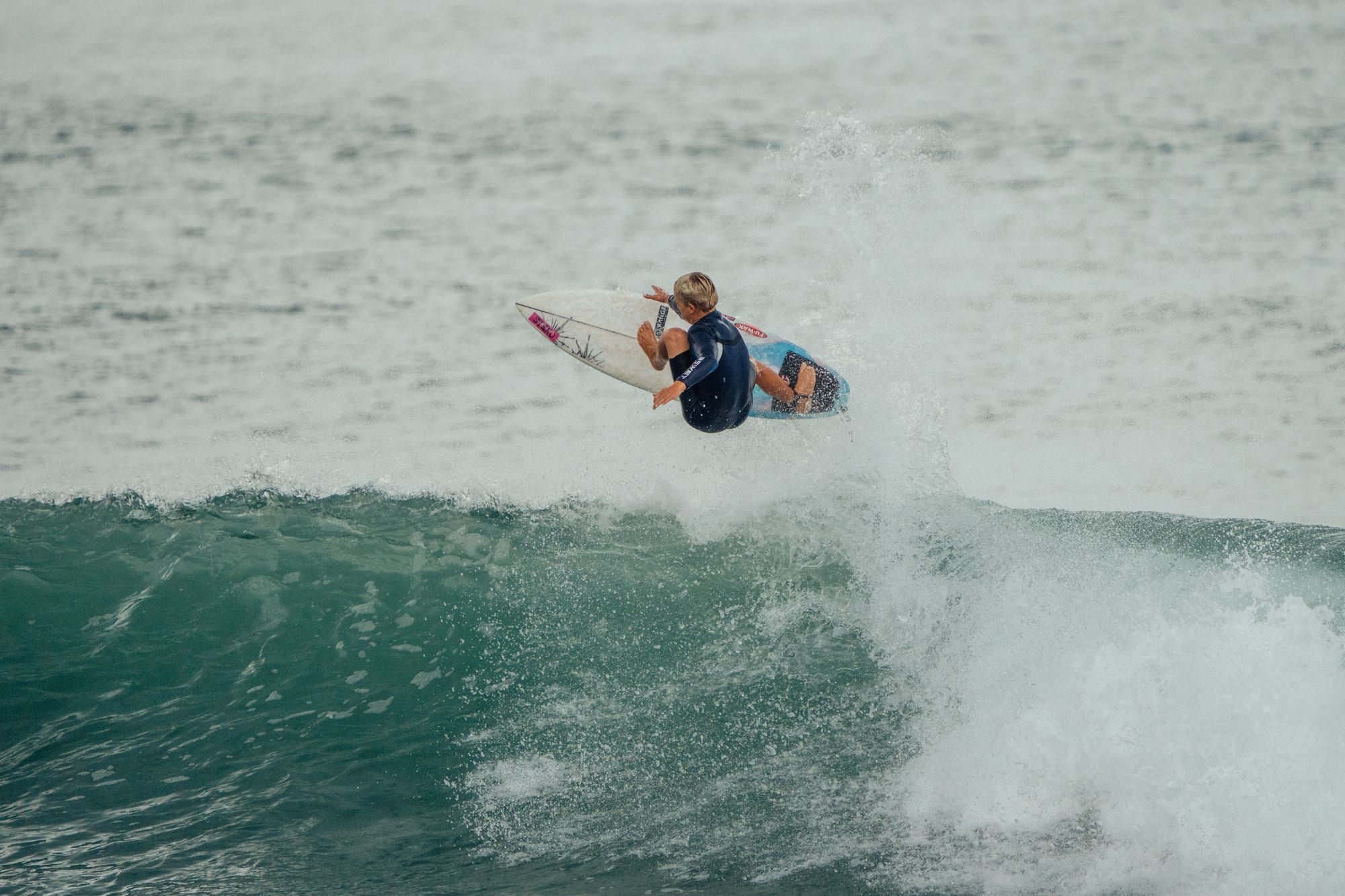 Surfer launching an air